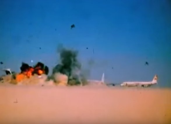 Aircraft being blown up in front of press