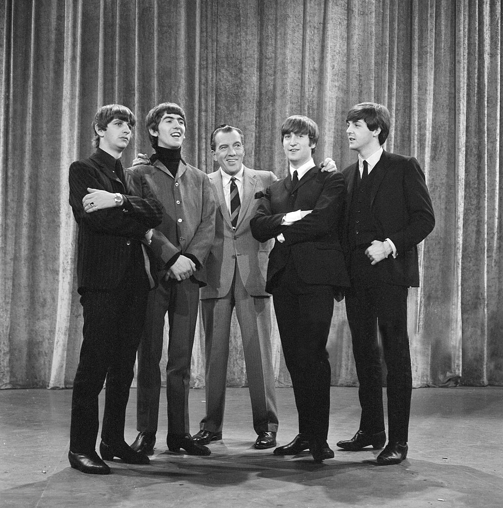 From left: Ringo Starr, George Harrison, Ed Sullivan, John Lennon, Paul McCartney