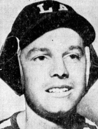 Bob Hunter wearing a 1939 model baseball batting helmet