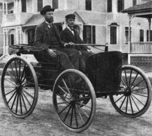 Charles (left) and Frank Duryea in one of their automobiles