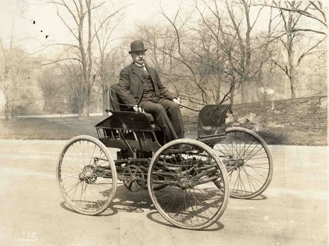 Haynes driving his first automobile, the Pioneer