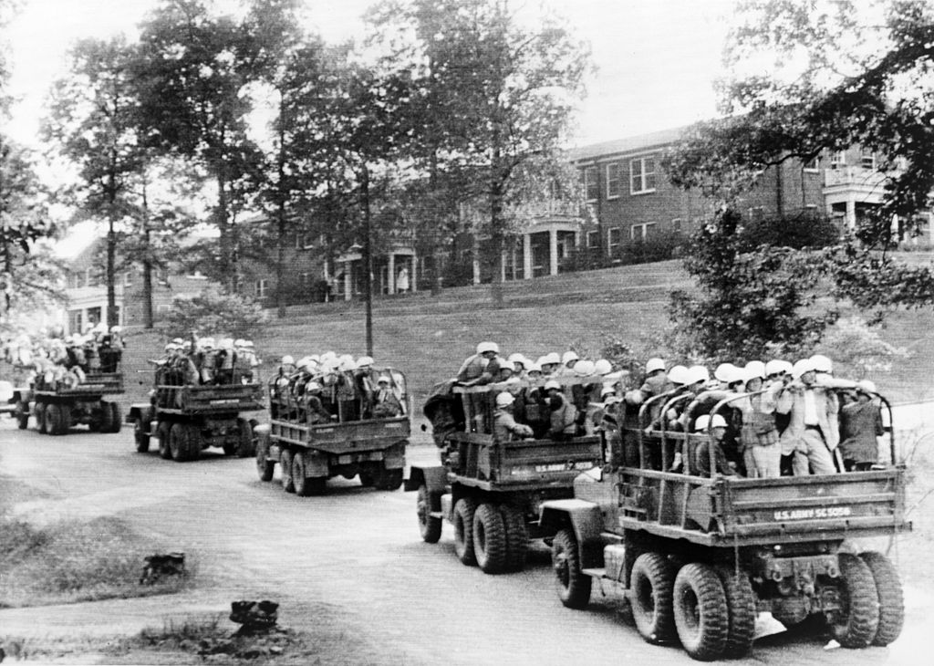 U.S. Army trucks roll across the University of Mississippi campus in the wake of the riots