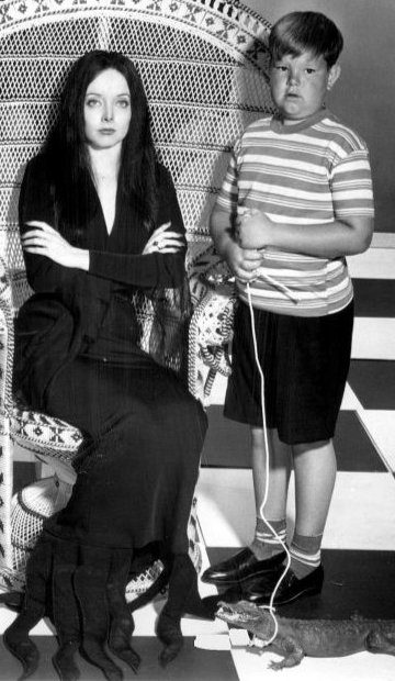 Ken Weatherwax as Pugsley Addams with Morticia