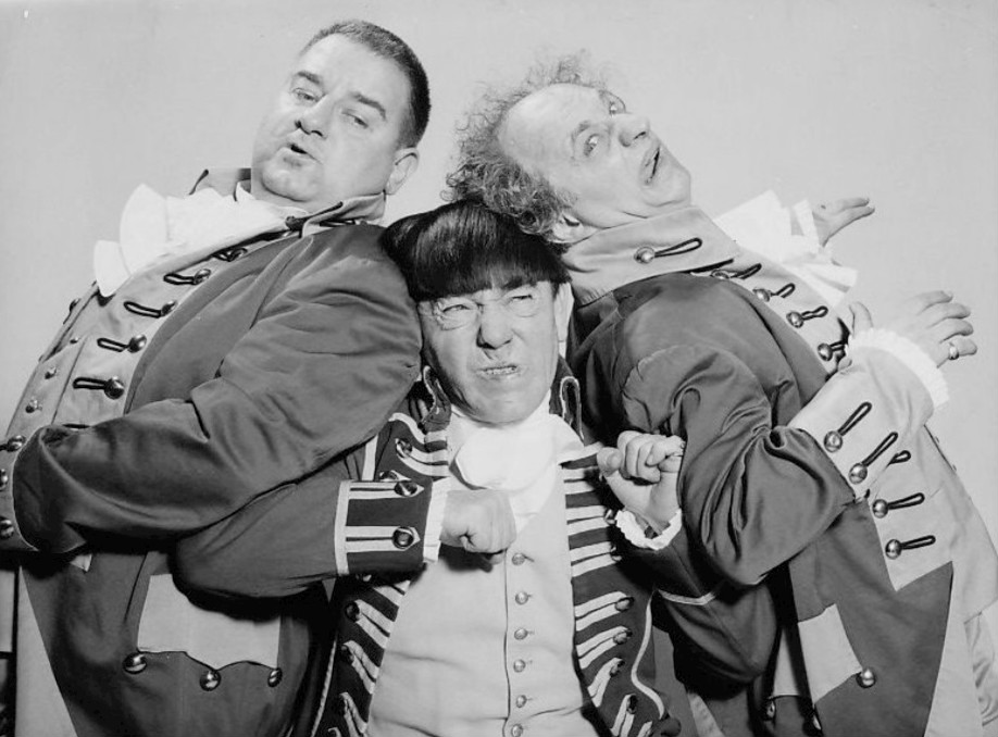 Curly Joe (left) with fellow stooges Moe Howard and Larry Fine