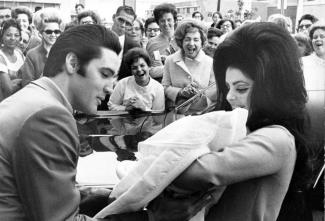 Elvis, Priscilla, and their daughter Lisa Marie
