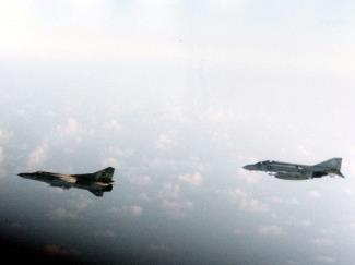 U.S. Navy Phantom II escorting a Libyan Mikoyan-Gurevich MiG-23