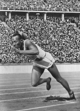 Jesse Owens Sets Multiple World Records