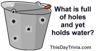 What is full of holes and yet holds water?
