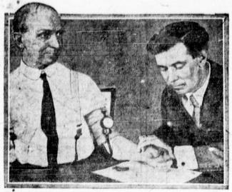 Marston (right) testing his lie detector